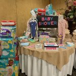 Members donated baby items for Women Resource Center residents.